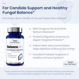 1MD Nutrition Oregano Supplement capsules on a wooden surface