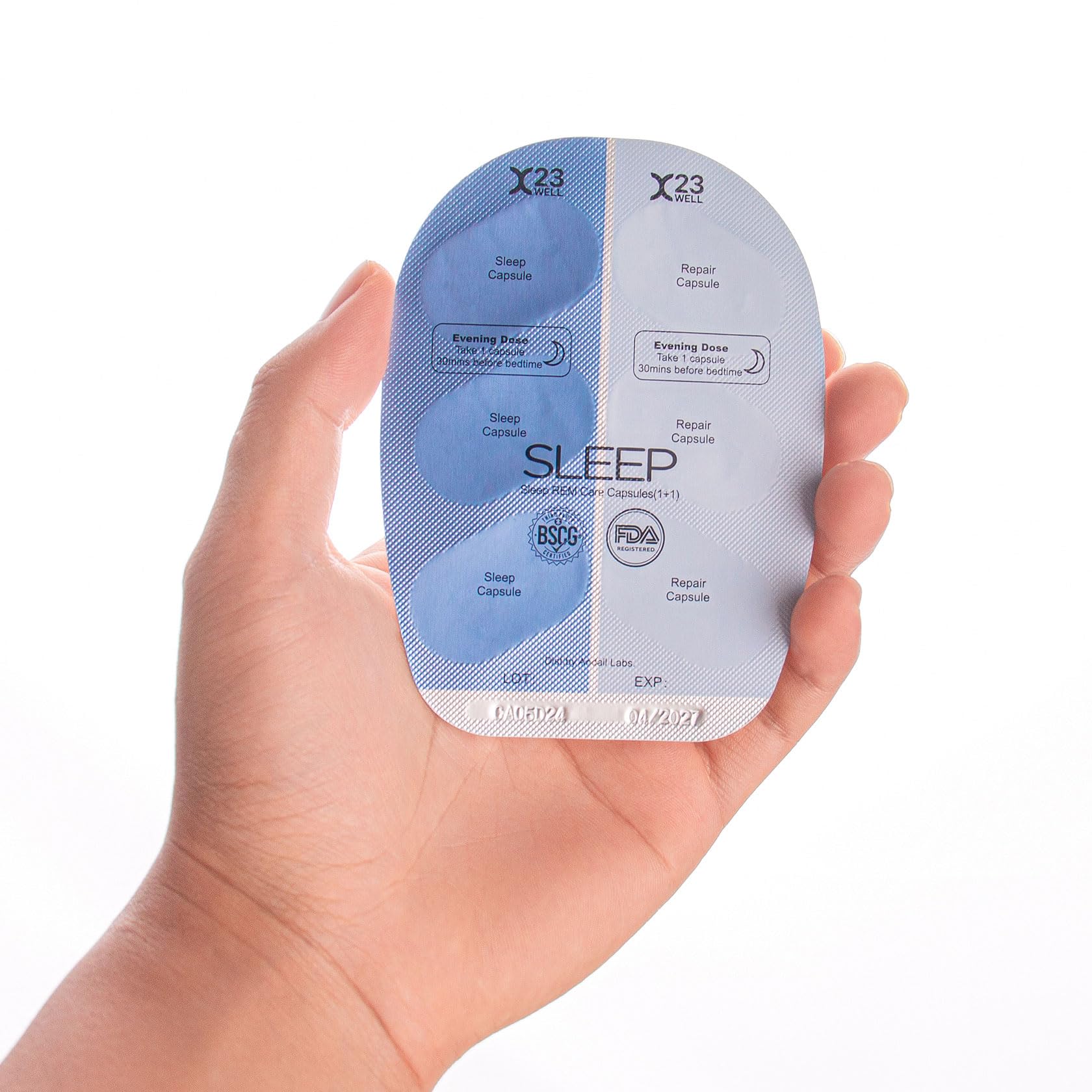23WELL Sleep Rem Care Capsules displayed on a wooden table