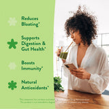 360 Nutrition Greens & Superfoods mixed in a glass of water
