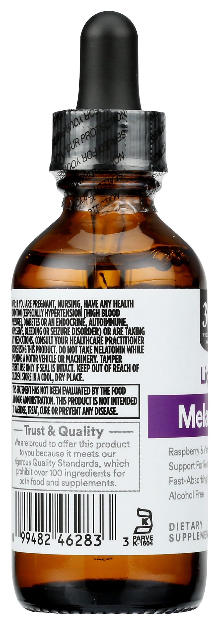 365 Liquid Melatonin 2 fl oz bottle with a measuring spoon