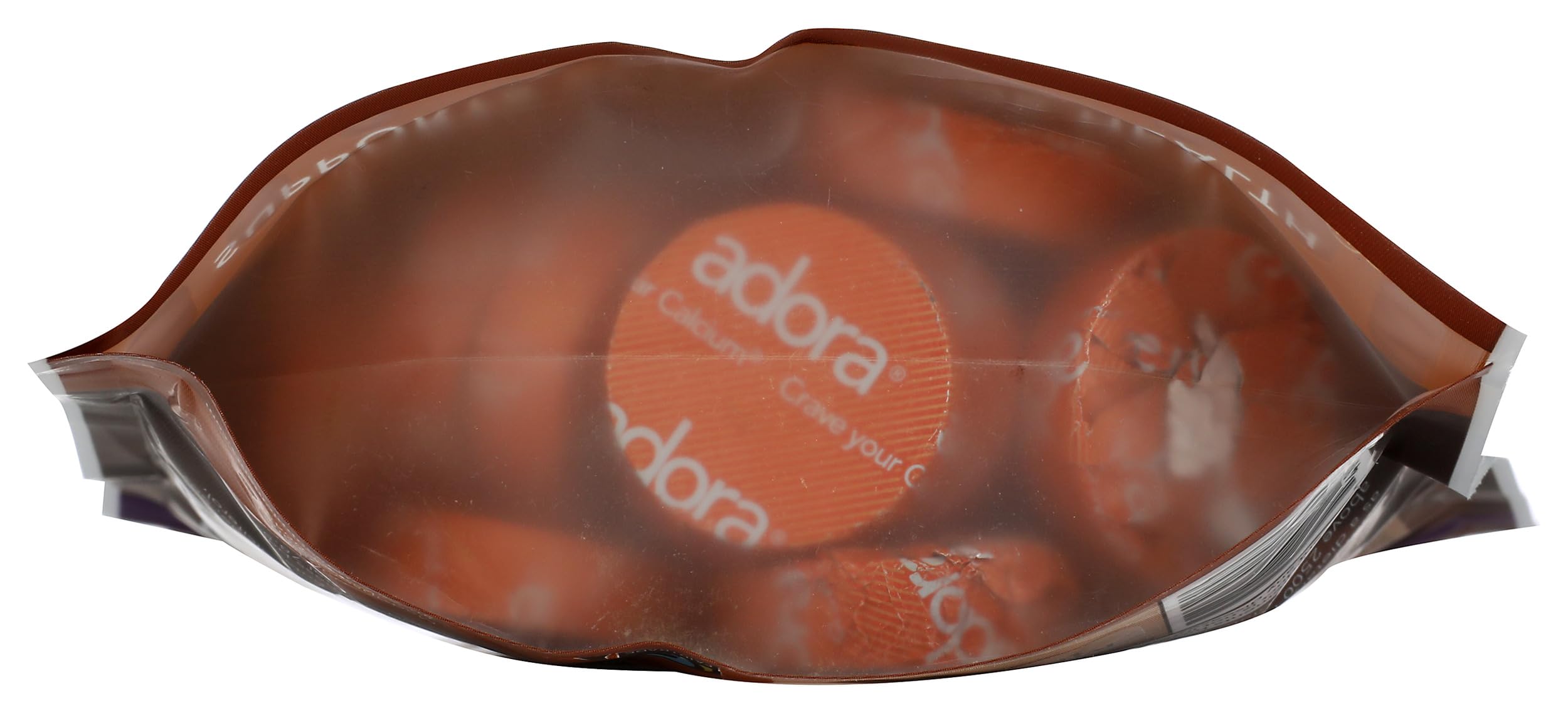 Adora Calcium Supplement milk chocolate disk with a measuring spoon