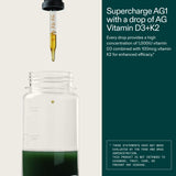 AG1 Vitamin D3 + K2 Liquid Drops in a glass