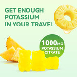 Agumoon Potassium Citrate Gummies with a measuring spoon