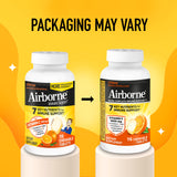 Airborne Citrus Chewable Tablets with a glass of water