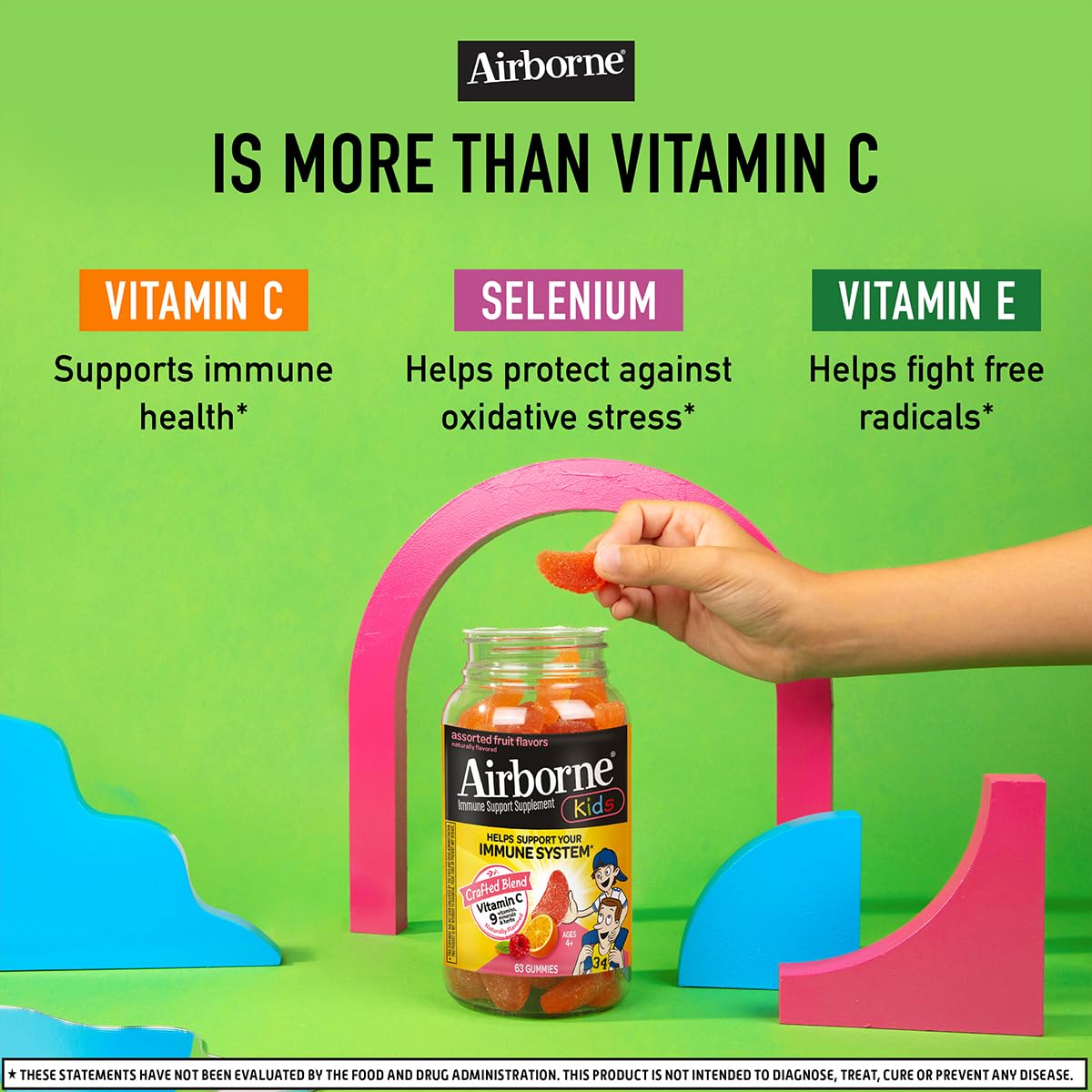Airborne Kids Vitamin C Gummies with a glass of water