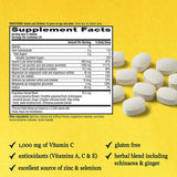 Airborne Vitamin C chewable tablets in hand for scale