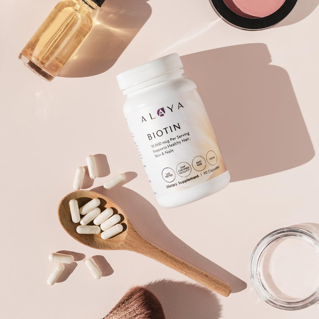 Alaya Naturals Biotin B7 Supplement with a measuring spoon