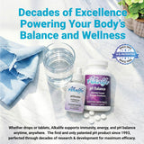 Alkalife pH Balance Tablets with a glass of water