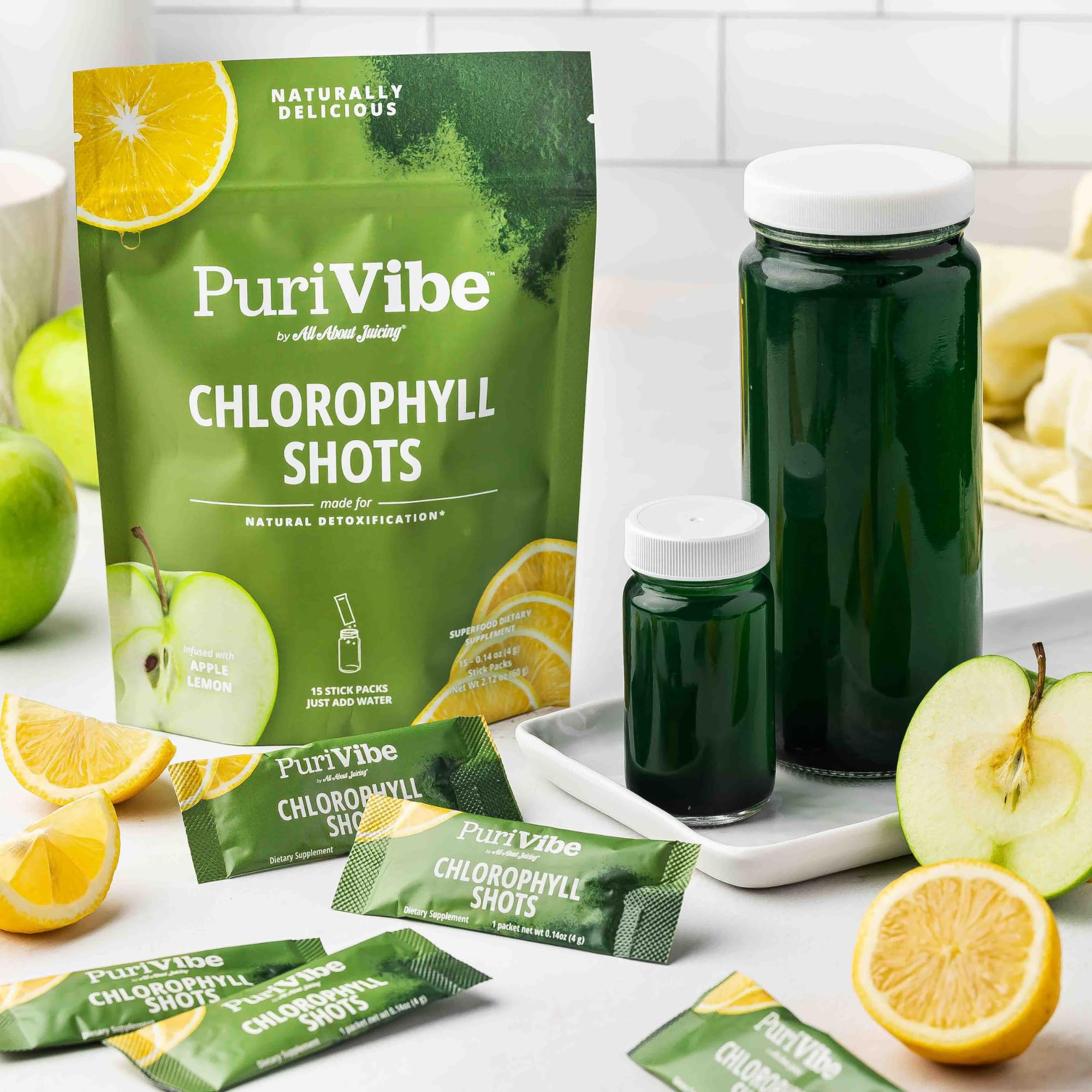 All About Juicing Chlorophyll Lemonade Powder Stick Pack with water
