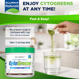 ALLMAX CytoGreens powder in a glass with water