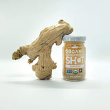 ALLWELLO Organic Ginger Wellness Shot lifestyle scene with fruits