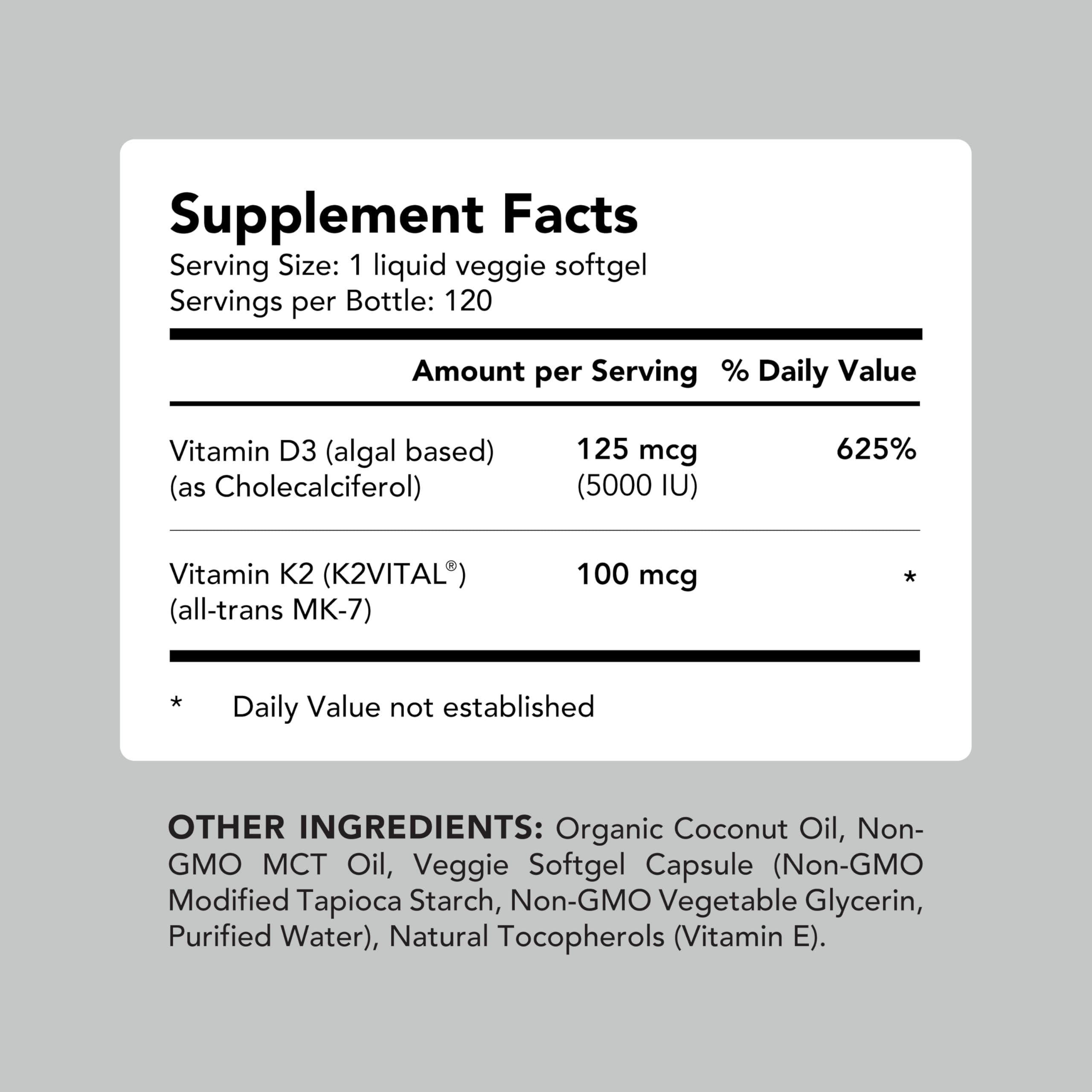 AMANDEAN Vitamin D3 + K2 softgels on a wooden table