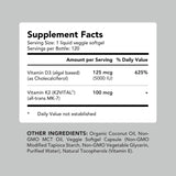 AMANDEAN Vitamin D3 + K2 softgels on a wooden table