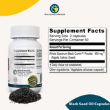 Amazing Herbs Black Seed Oil Capsules on a wooden table