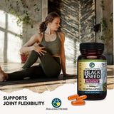 Amazing Herbs Black Seed Oil Capsules with a measuring spoon