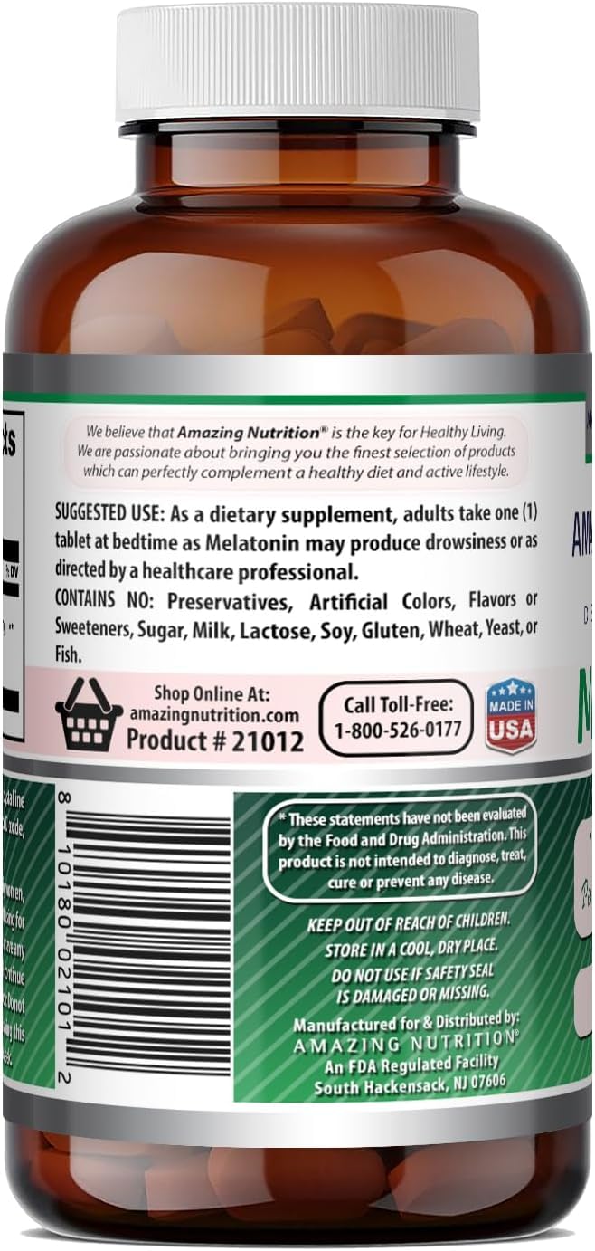 Amazing Nutrition Melatonin Tablets on a wooden table