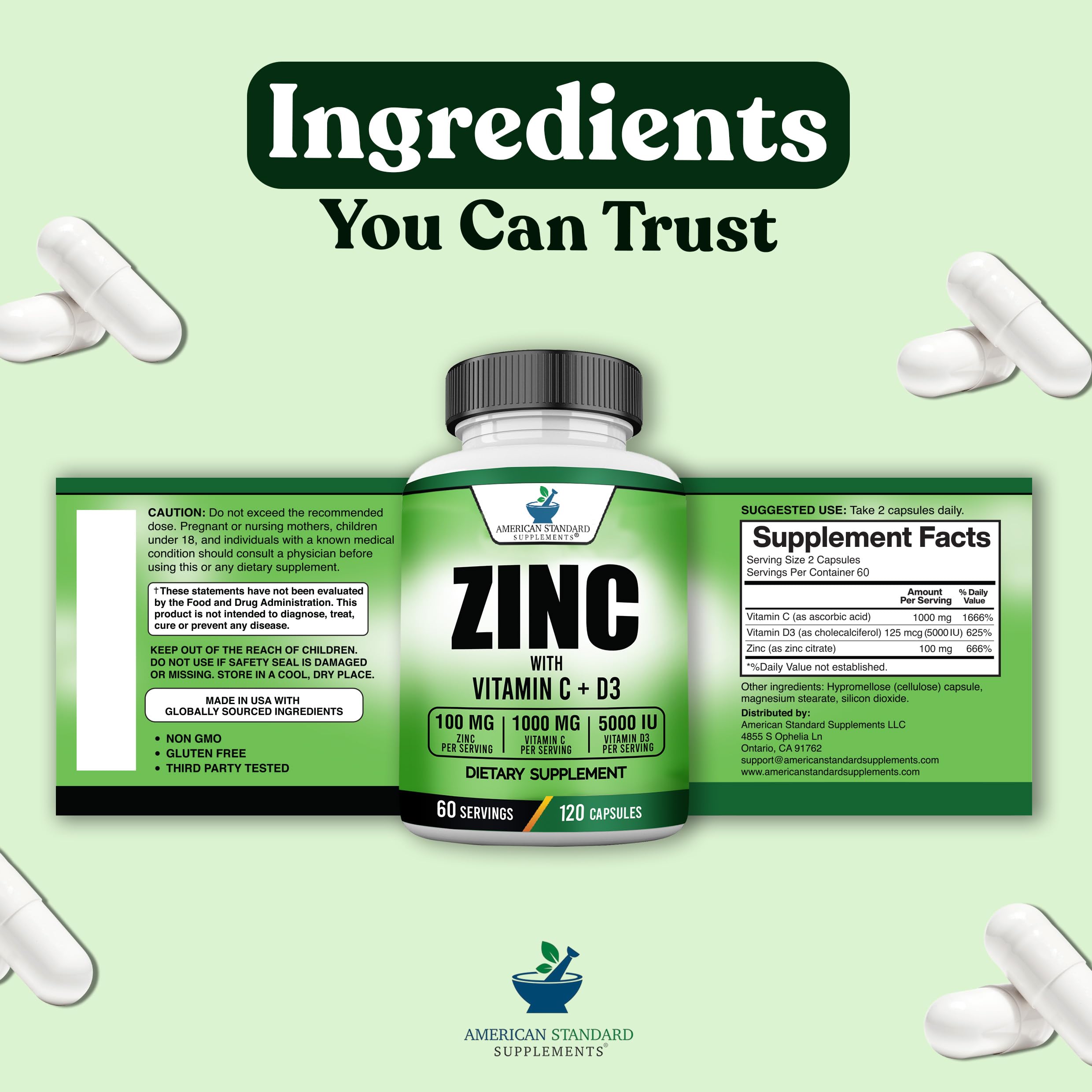 American Standard Supplements Zinc 100mg Vitamin C 1000mg Vitamin D3 5000 IU capsules in a hand