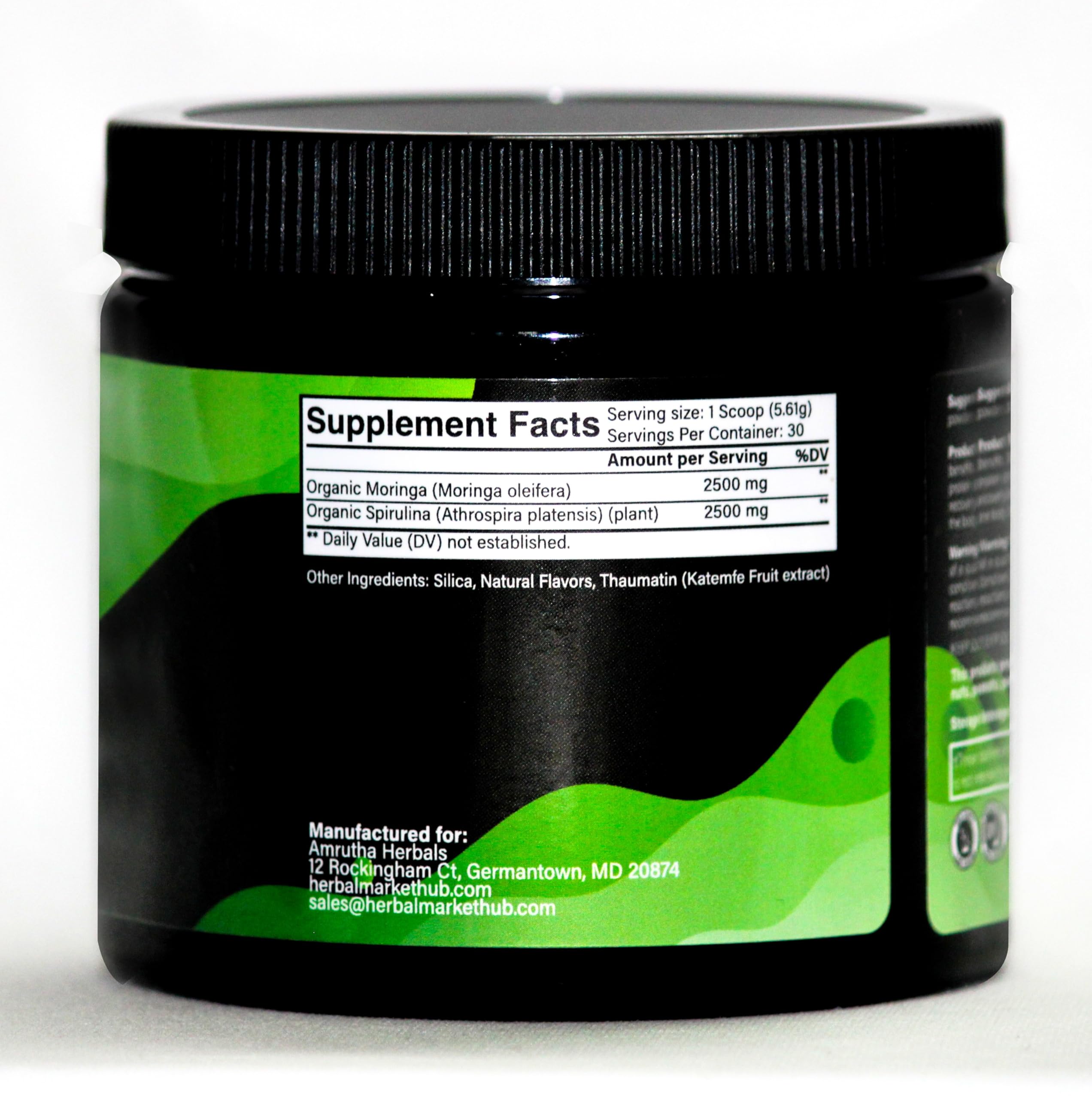 Amrutha Herbals Organic Spirulina + Moringa Powder serving suggestion in a glass of water