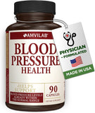 AMVILAB Daily daily wellness Supplement capsules in a hand