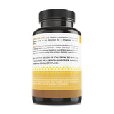 Ancient Bliss Natural Milk Thistle capsules in a hand