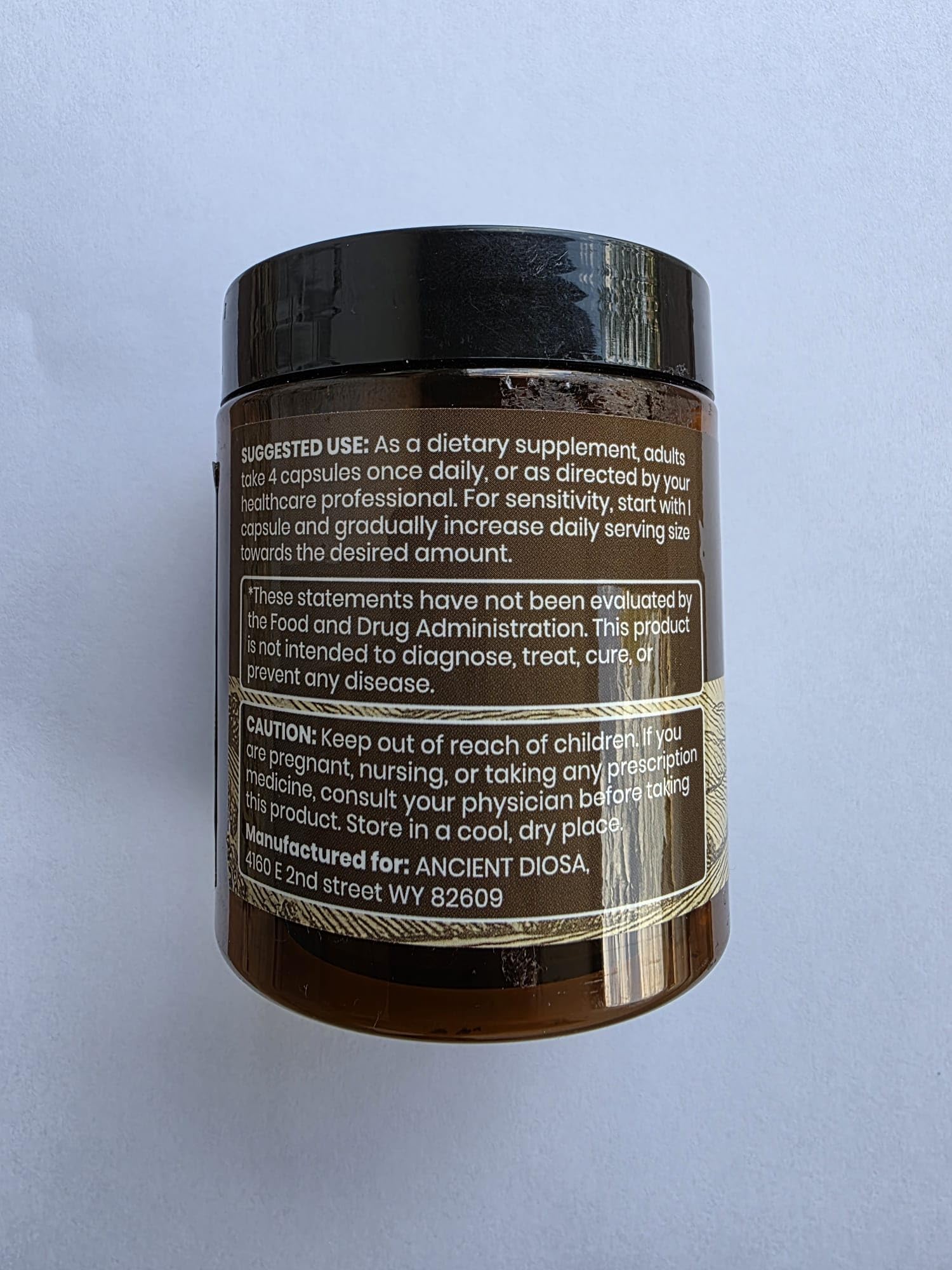 ANCIENT DIOSA Beef Liver Capsules 3000mg on a wooden table
