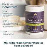 Ancient Nutrition Colostrum Powder 28g mixed in a glass of water