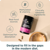 Ancient Nutrition Multivitamin Capsules on a wooden surface