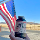 Ancient Origins Bone Marrow Collagen Supplement on a wooden table
