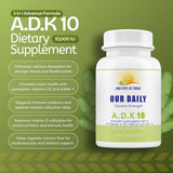 AND GIVE US TODAY OUR DAILY ADK Vitamin Supplement bottle side view