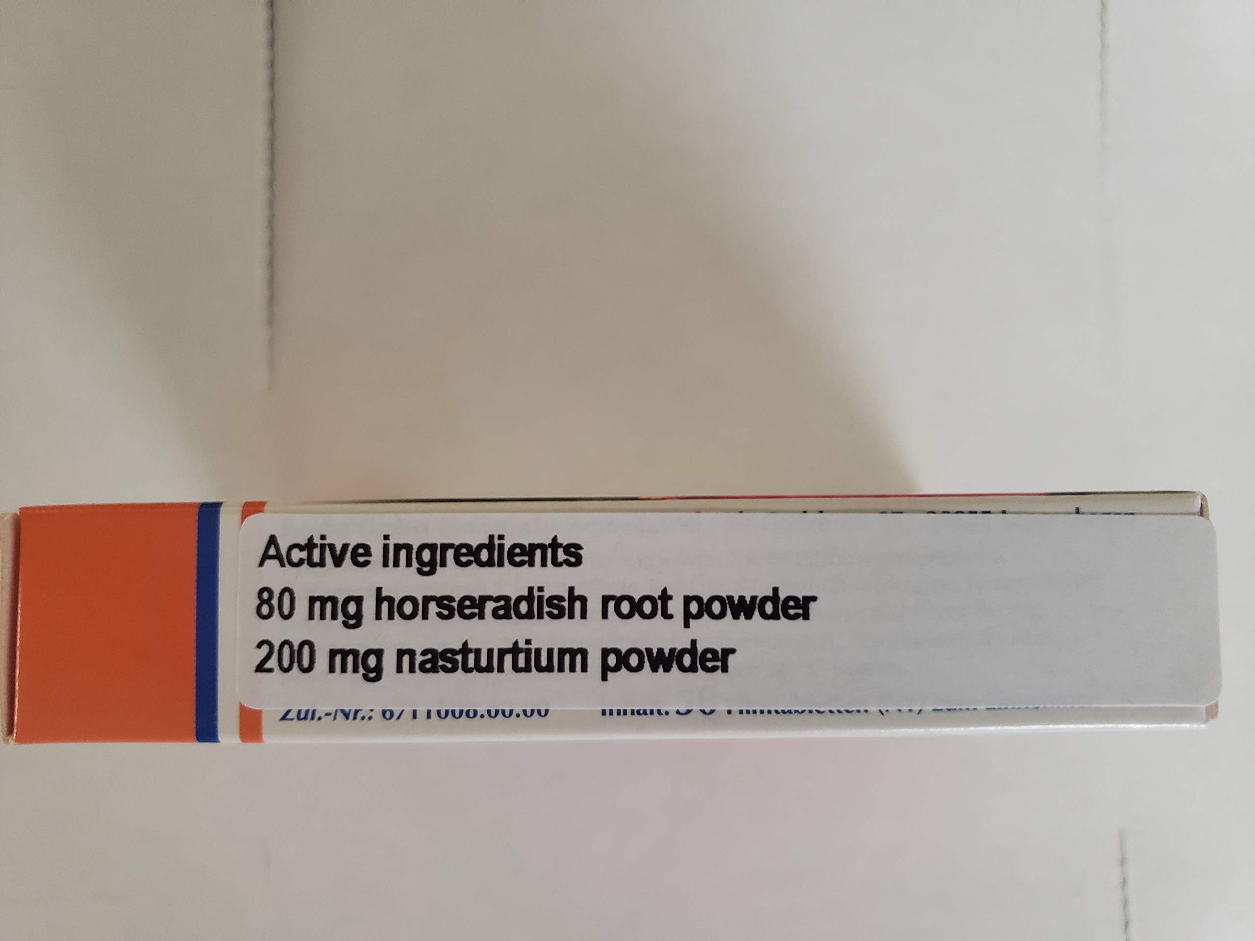 ANGOCIN Herbal Supplement tablets close-up