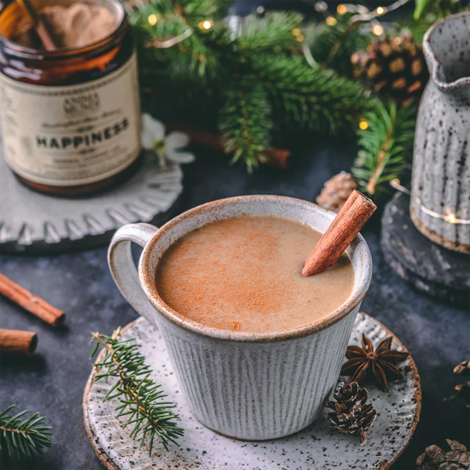 Anima Mundi Happiness Tonic Powder mixed with milk in a cup