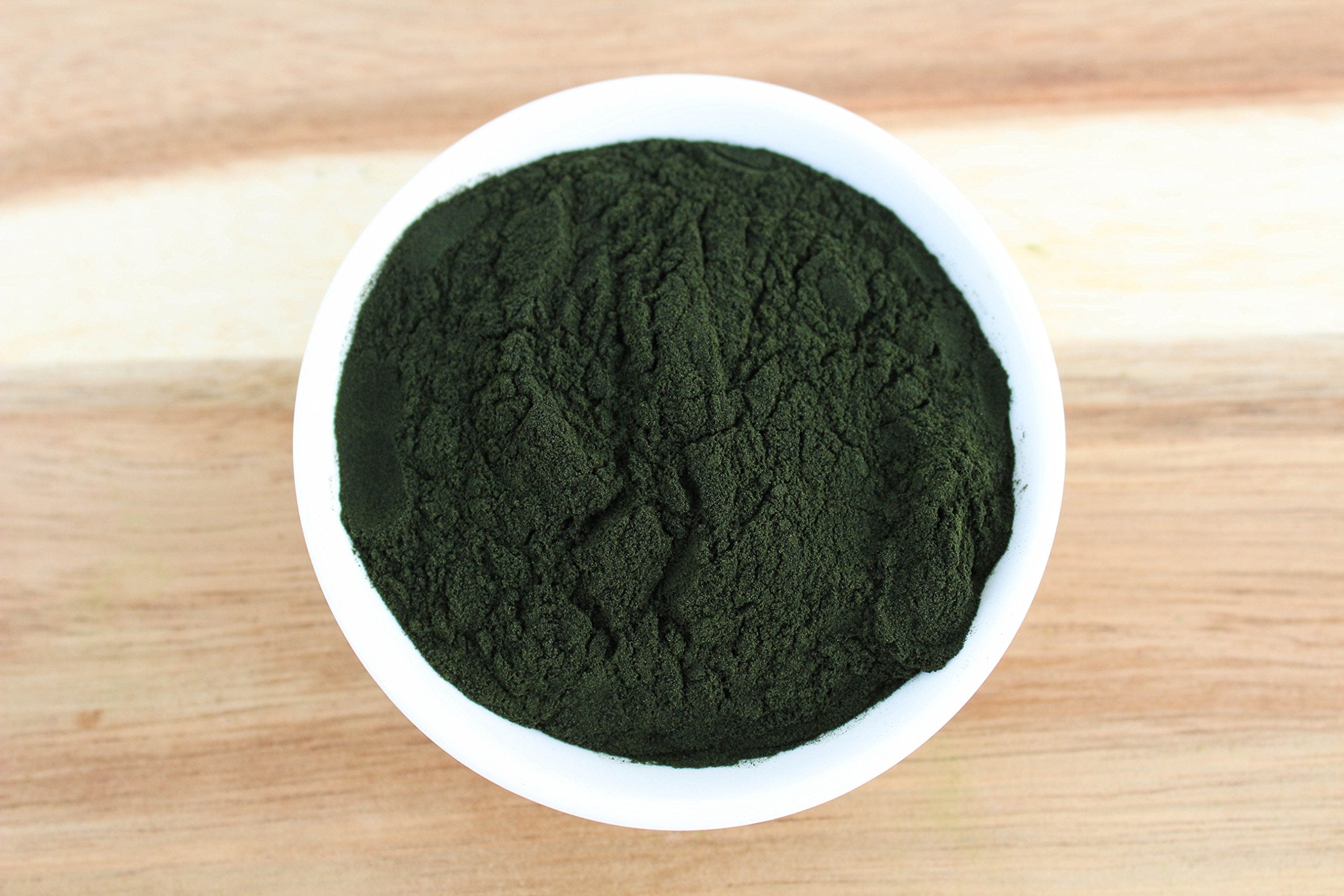 Anthony's Organic Chlorella Powder sprinkled on a smoothie