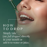 Apothékary All-in-One Vitamin & Mineral Support in a glass of sparkling water