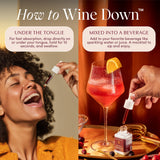 Apothékary Wine Down Herbal Drops in a glass with berries