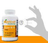 Apricot Power Pangamic Acid B-15 TMG supplement on a wooden table