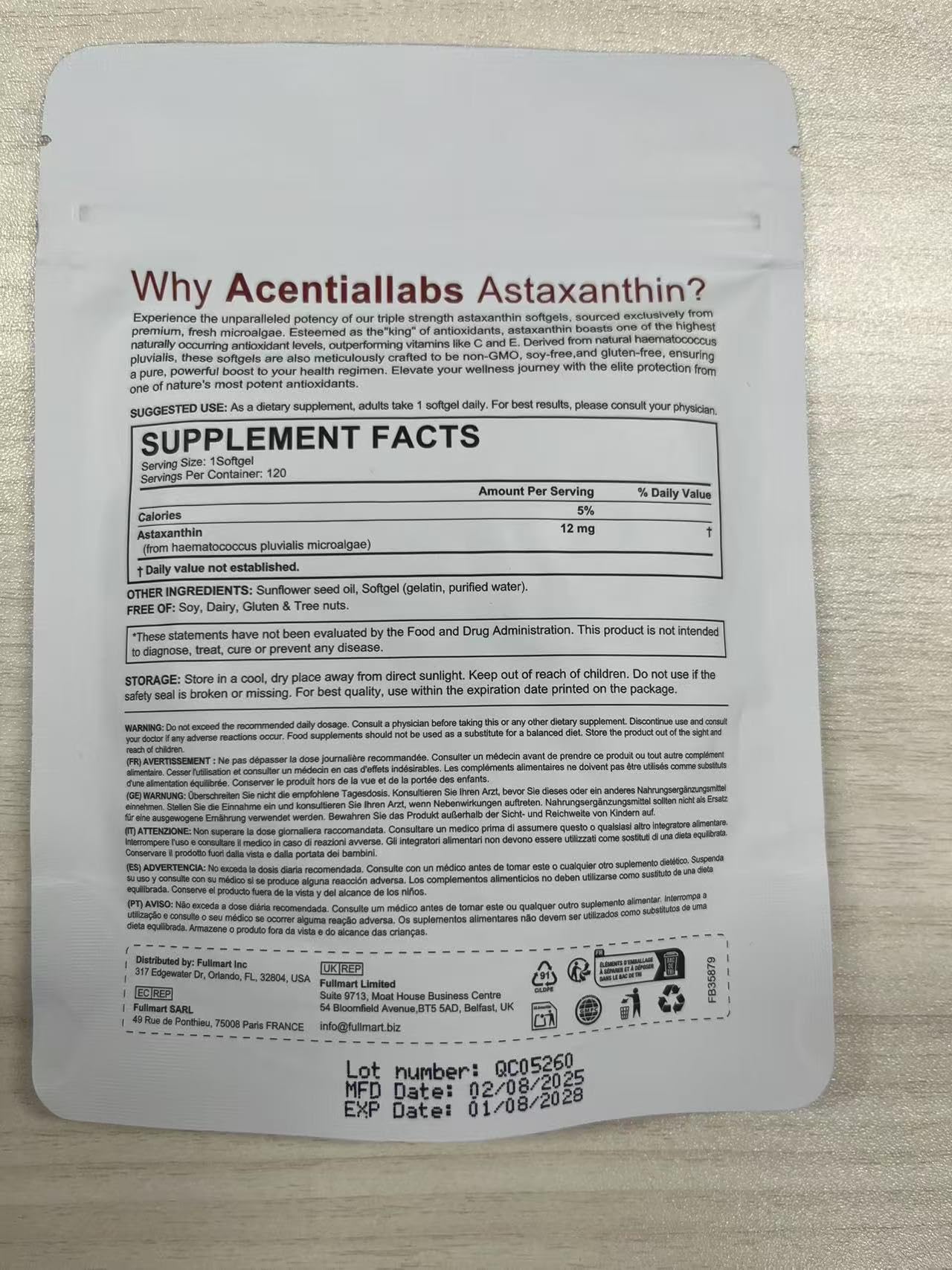 Arkture Astaxanthin Supplement with softgels on a wooden table