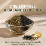 AROMAVITA Organic Oregano Oil & Black Seed Oil Softgels on a wooden table