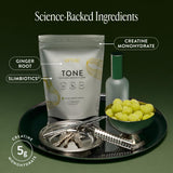 Arrae Tone Creatine Gummies on a wooden table