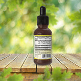 Arymar Vitamin C Liquid Supplement displayed with fresh oranges