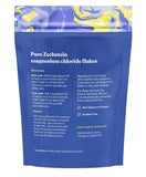 ASUTRA Magnesium Bath Flakes being poured into a bath