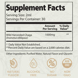 Auri Super Chaga Elixir with a glass of water