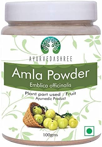 AYURVEDASHREE Amla Powder 100g in a bowl with raw Amla fruit