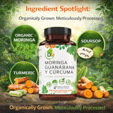 B-Experts Moringa Curcuma Guanabana Capsules on a wooden table