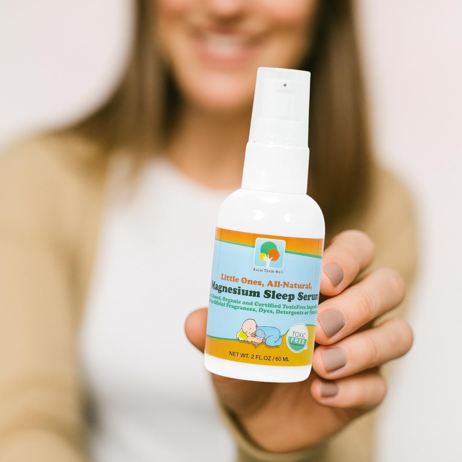 Back view of Raise Them Well Infant Magnesium Sleep Serum bottle