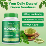 Balincer Moringa Capsules arranged on a wooden surface