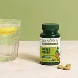 Banyan Botanicals daily wellness Strong Turmeric Supplement on a wooden table