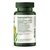 Banyan Botanicals Everyday Greens Organic Superfood Tablets on a wooden table