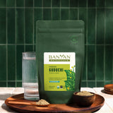 Banyan Botanicals Giloy Powder in a bowl with honey