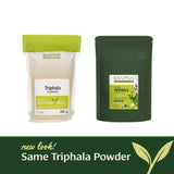 Banyan Botanicals Triphala Organic Powder on a wooden table