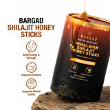 Bargad Shilajit Dark Chocolate Honey Sticks on a wooden table